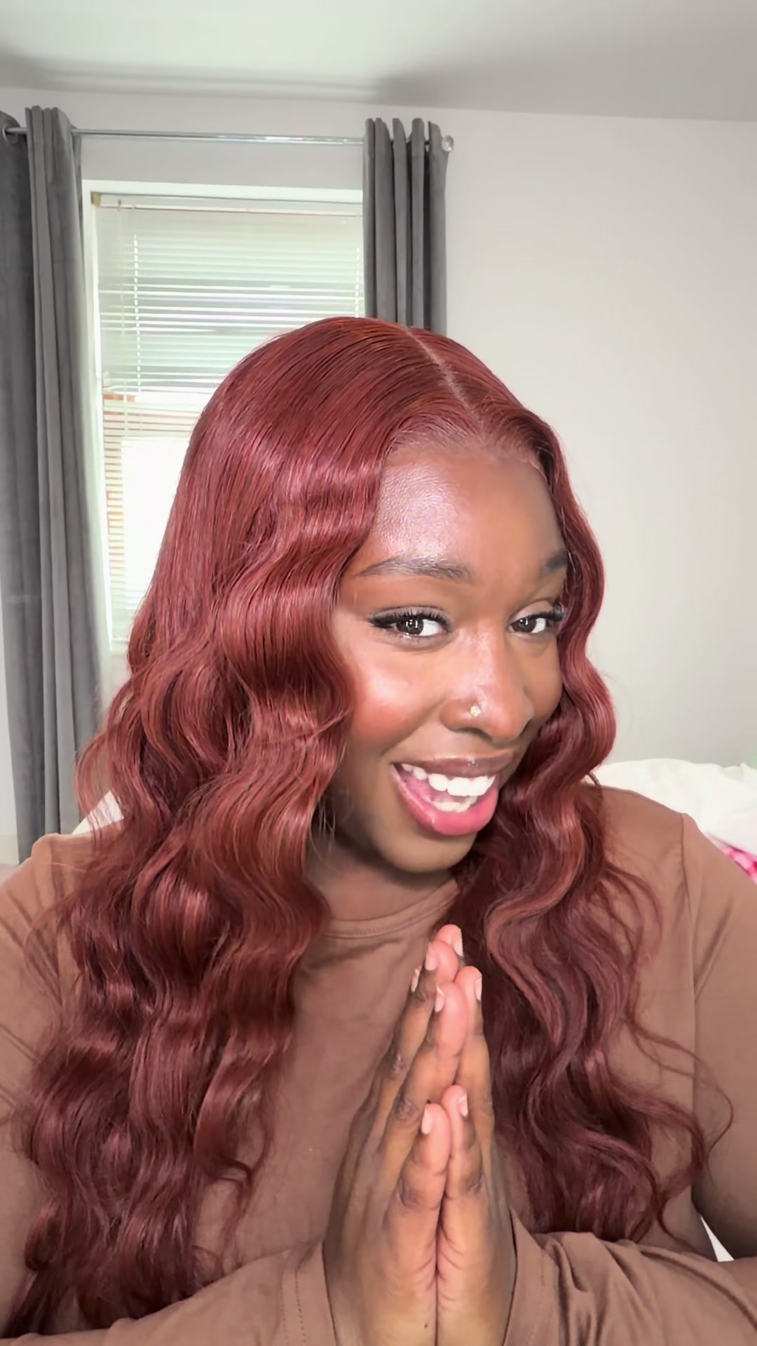 TikTok post by an influencer for OQ HAIR WIG. Caption reads: [...] lot of fun🤭😍I’m obsessed @OQ HAIR WIG....