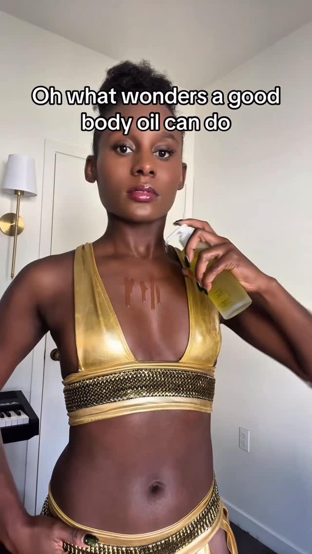 Instagram post by @nifaratheicon for OSEA Malibu. Caption reads: Nothing like being lathered in oil and glistening....