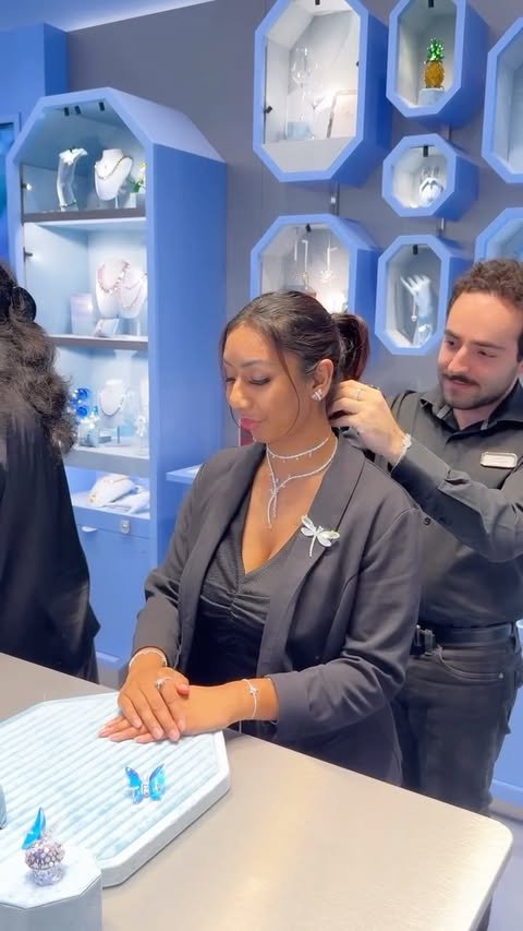 Instagram post by @alishaa.ishani for SWAROVSKI. Caption reads: [...] Brand Ambassador @arianagrande & Swarovski....