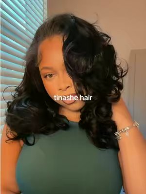 TikTok post by @iamvaehelizabeth for Tinashe Hair. Caption reads: @tinashehair 🩷 #halfwig #gluelesswigs #wiginstall....