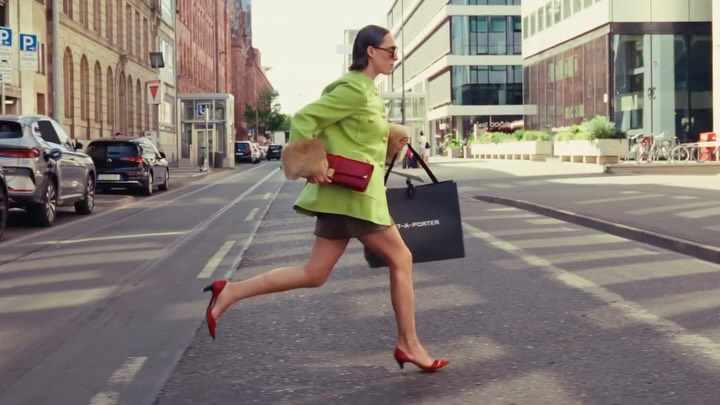 Instagram post by @lara_bsmnn for NET-A-PORTER. Caption reads: Running late, serving looks @netaporter 🩷 |....