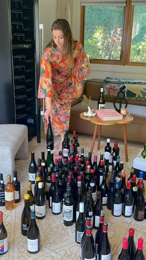 Instagram post by @barpilarr for WineEnthusiast. Caption reads: Got my new cellar from @wineenthusiast set up just....