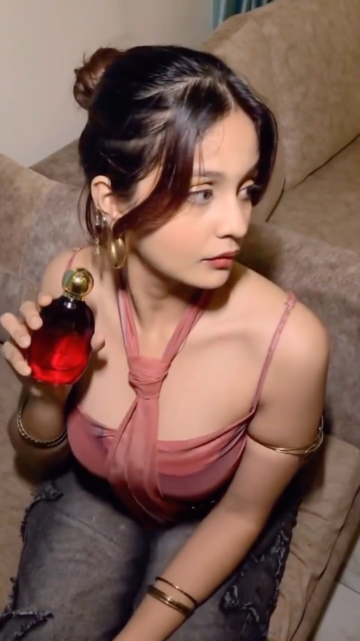 Instagram post by @cookiecantrelate for French Essence. Caption reads: matching my fits with my perfume bottles 🤭💗....