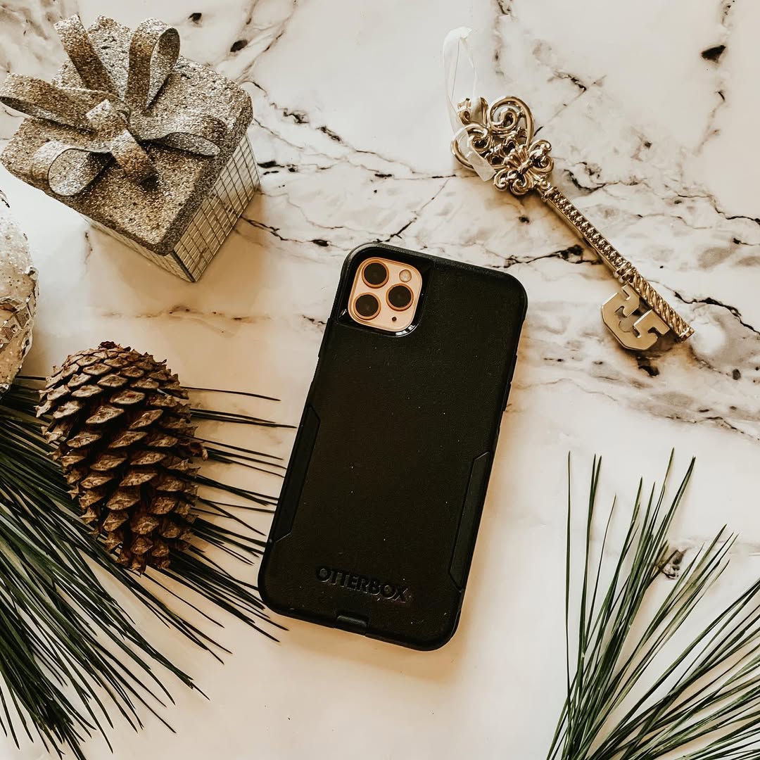Instagram post by @jennylynnebrooks for Otterbox. Caption reads: TOP GIFT IDEA 🎁🌲🤶🏻
A new iPhone 11 is....