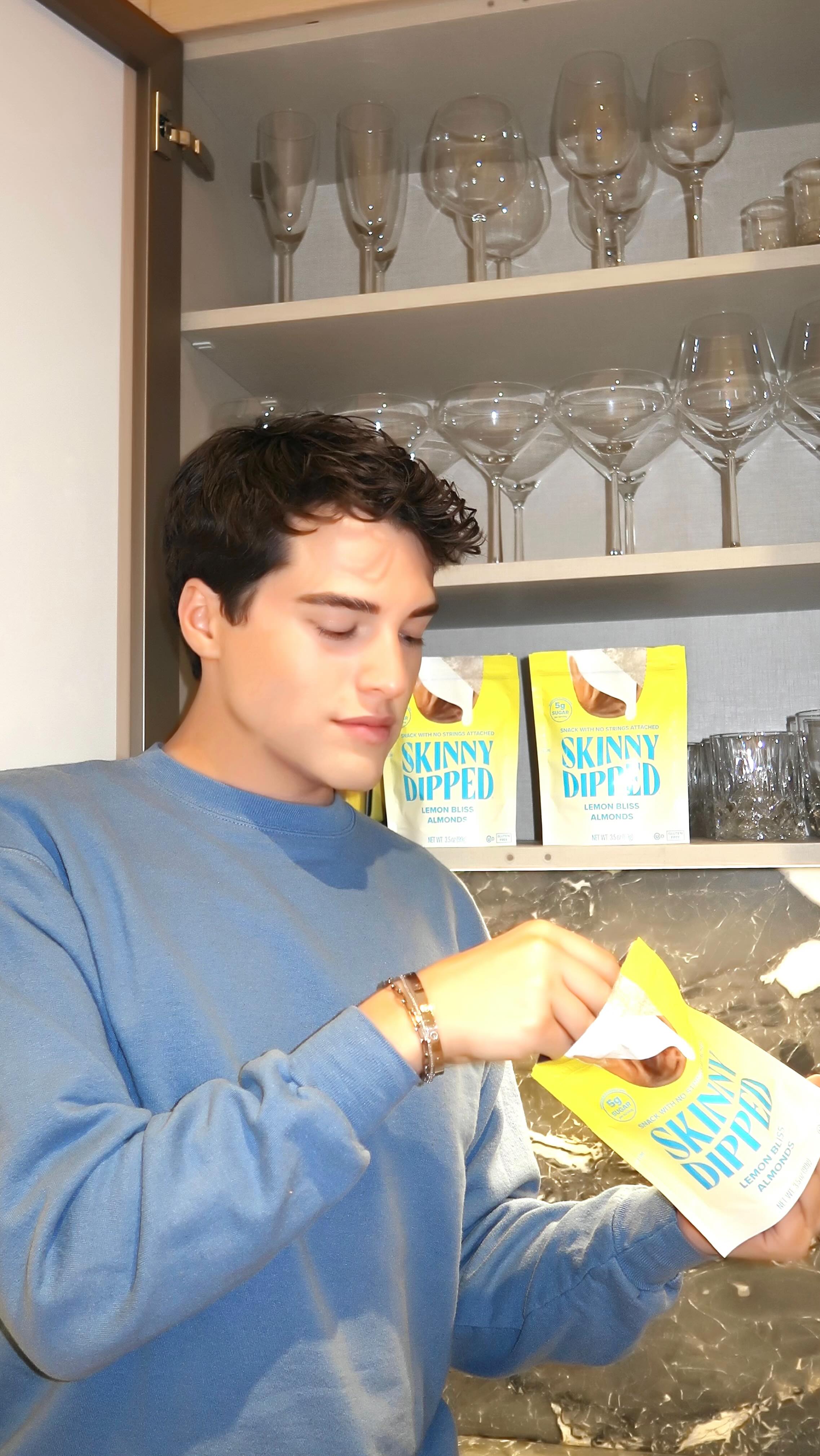 Instagram post by @brooksmarks for SkinnyDipped. Caption reads: my snack of the summer @SkinnyDipped 🍋....