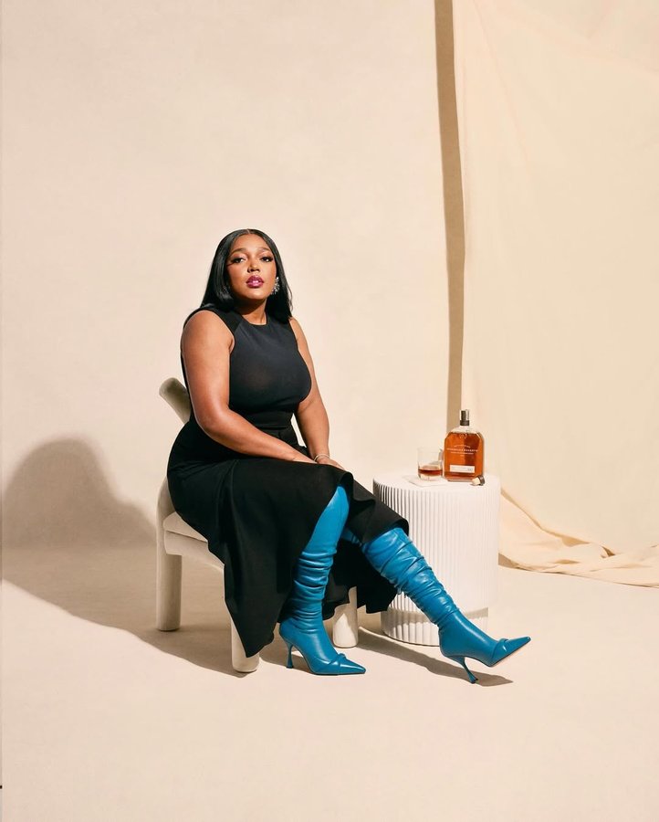 Instagram post by @anifam for Woodford Reserve. Caption reads: I am beyond excited and honored to announce our....