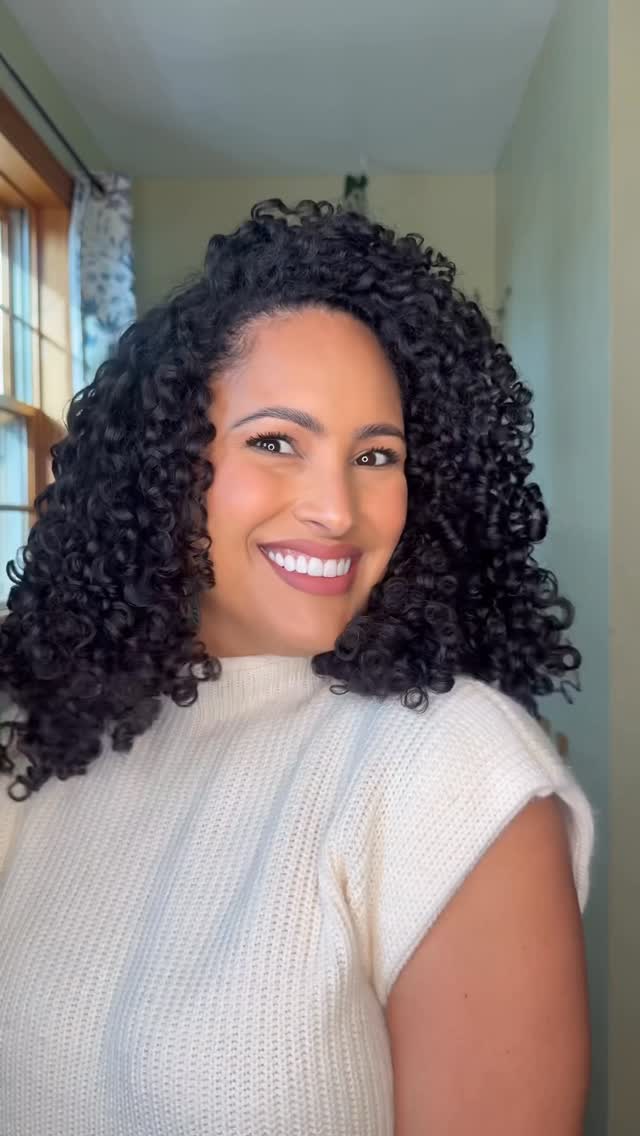 Instagram post by @cooking_con_omi for DevaCurl. Caption reads: ✈️ Trips can get hectic, but my curls? They always....