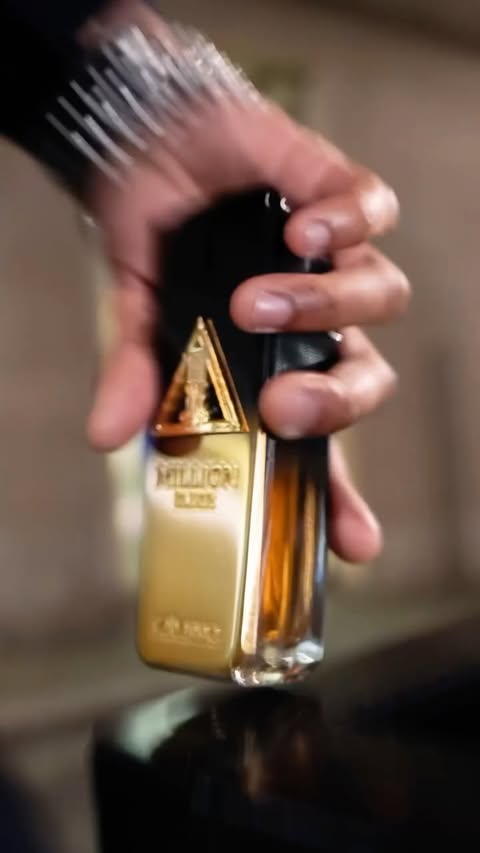 Instagram post by @moonscotty_ for Rabanne. Caption reads: [...] night, with 1 Million Night Elixir by....