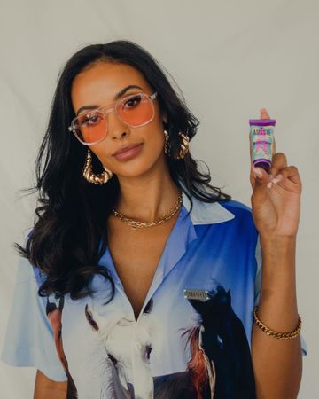 Instagram post by @mayajama for Aussie Hair. Caption reads: A lil shot with my lil shot
The miracle SOS shots....