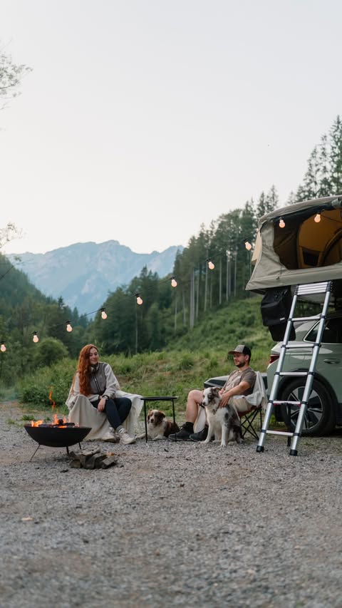 Instagram post by @twomerlecollies for Thule. Caption reads: [...] #camping #campingcookies #bringyourlife....