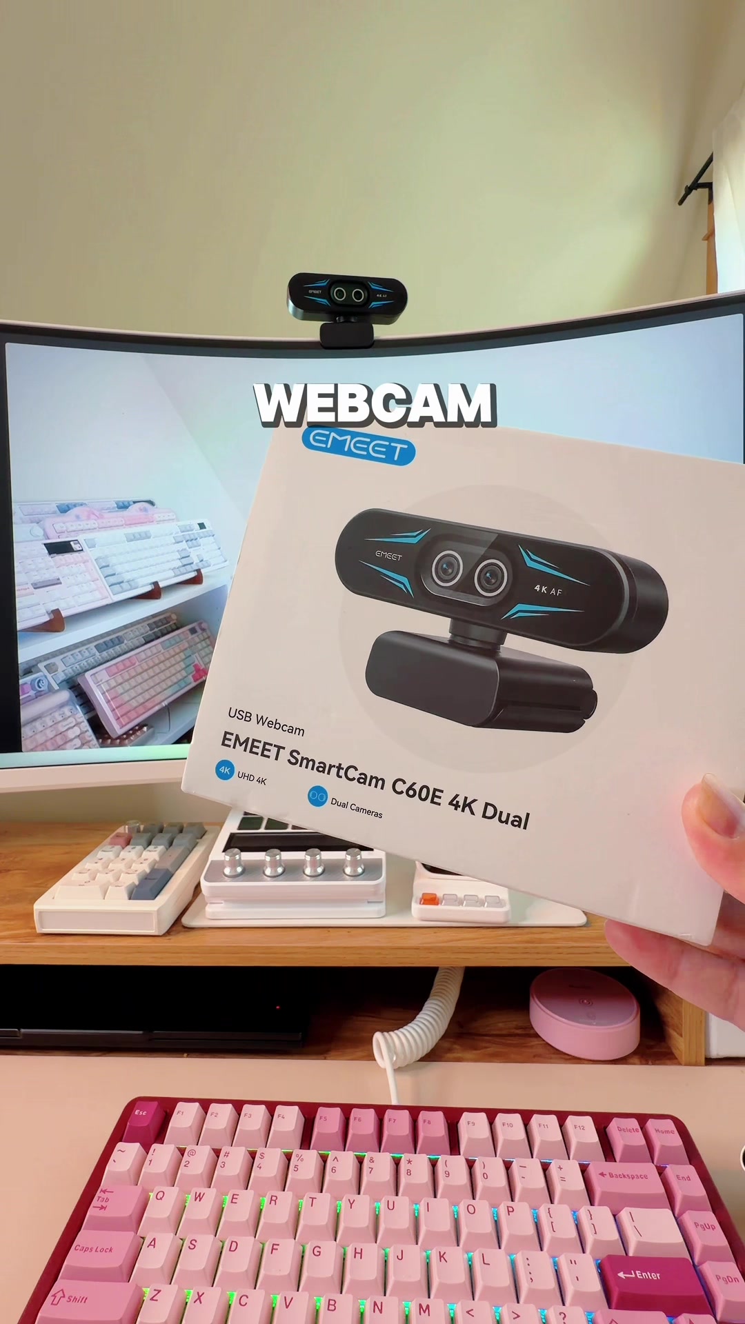 TikTok post by @shem.cozydesk for EMEET. Caption reads: [...] built-in camera—but ever since I got the....