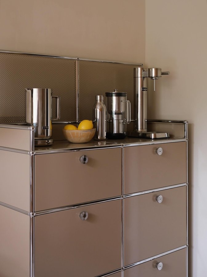 Instagram post by @ckuemmecke for aarke. Caption reads: Anzeige | The @aarke Corner – halfway between....