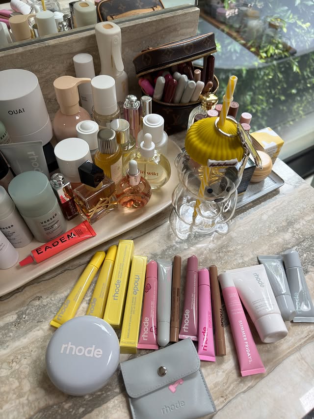 Instagram post by @moodpourtoi for indē wild. Caption reads: vanity girl mess at its best ☁️🫧 … @rhode girl....