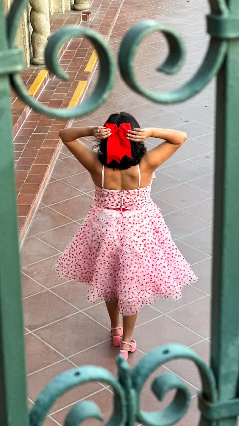 Instagram post by @thekatadventure for Unique Vintage. Caption reads: [...] red glitter heart cupcake dress from....