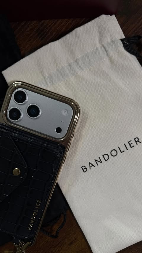 Instagram post by @kanashulya for BANDOLIER. Caption reads: [...] essentials into fashion statements 🖤....