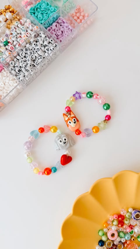 Instagram post by @liddierowl for Bluey. Caption reads: AD ✨🧡 BLUEY BRACELETS 🧡 ✨ • Bingo and Lila [...].