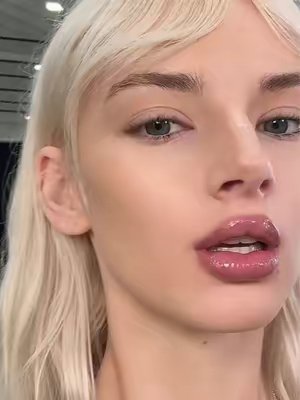 TikTok post by @sarahtannomakeup for Haus Labs. Caption reads: [...] tiktok shade Smokey Mauve @Haus Labs....