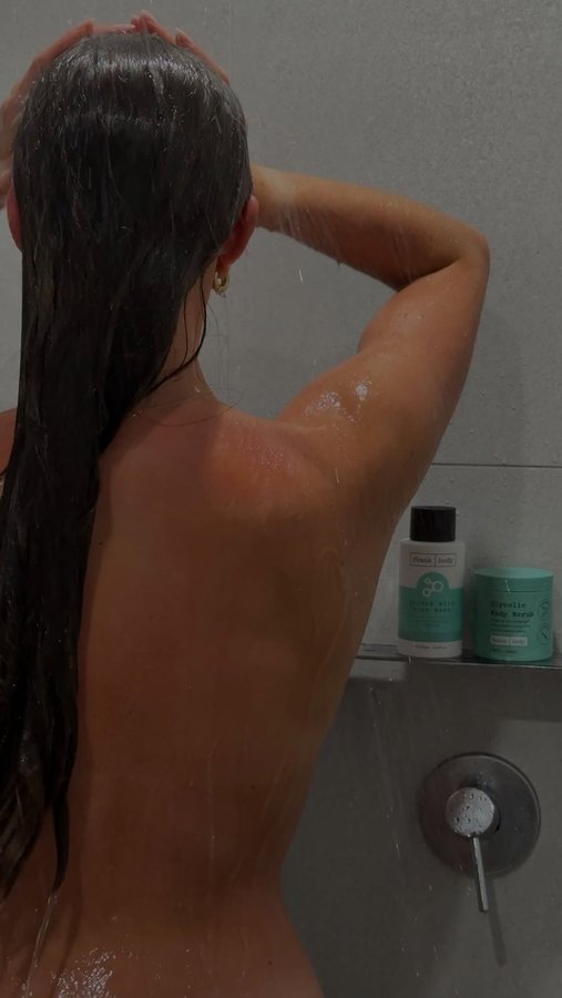 Instagram post by @caityviant for Frank Body. Caption reads: The perfect post-workout everything shower 🫧✨
Let....