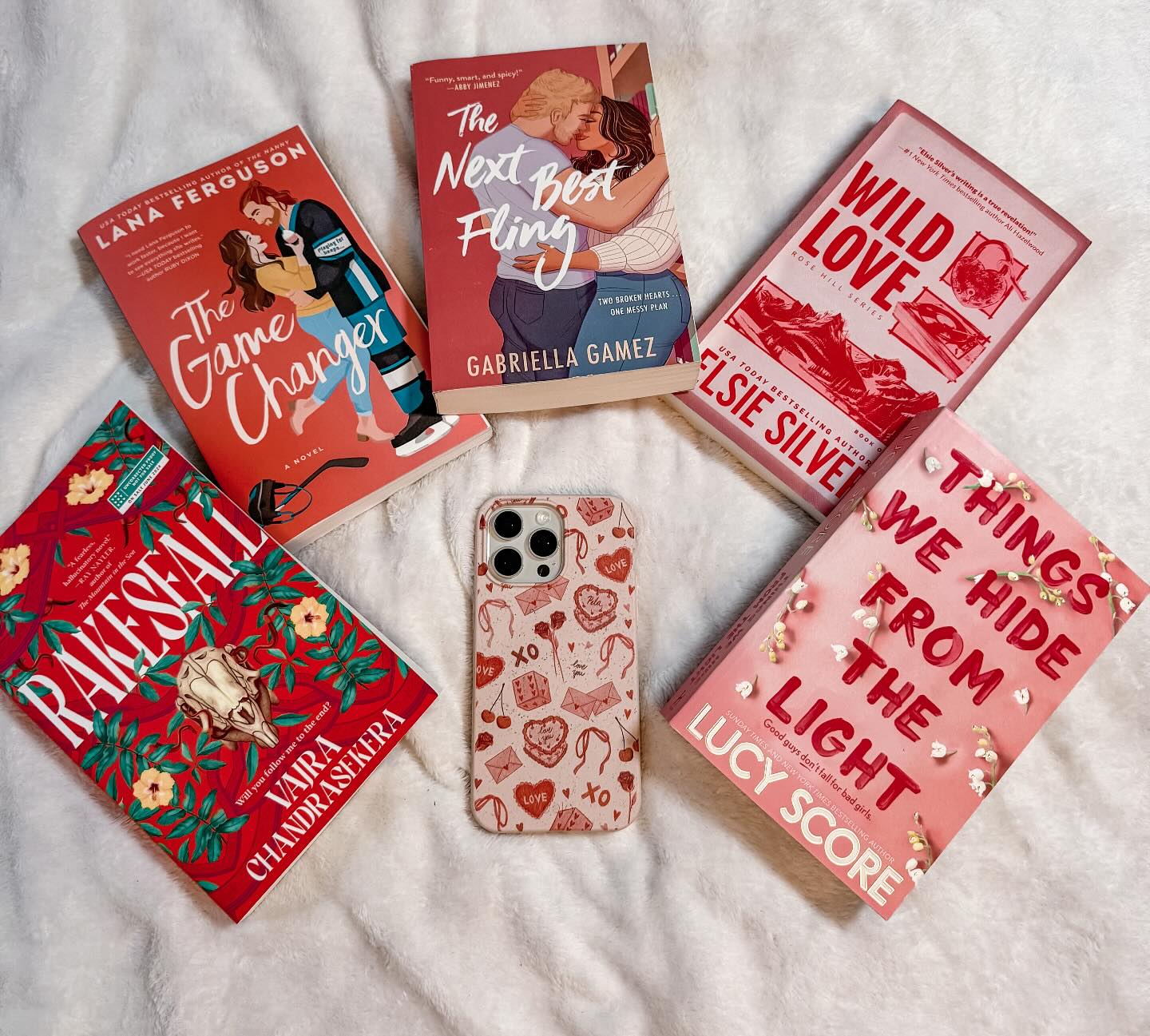 Instagram post by @bookish.bai for Pela Case. Caption reads: 💖Pink Wednesday w/ Pela Case💖 

Okay but how....