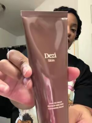 TikTok post by @ohthatstybaby__ for DEZI SKIN. Caption reads: [...] part of the day 😭✨ Tonight’s MVP: @deziskin....