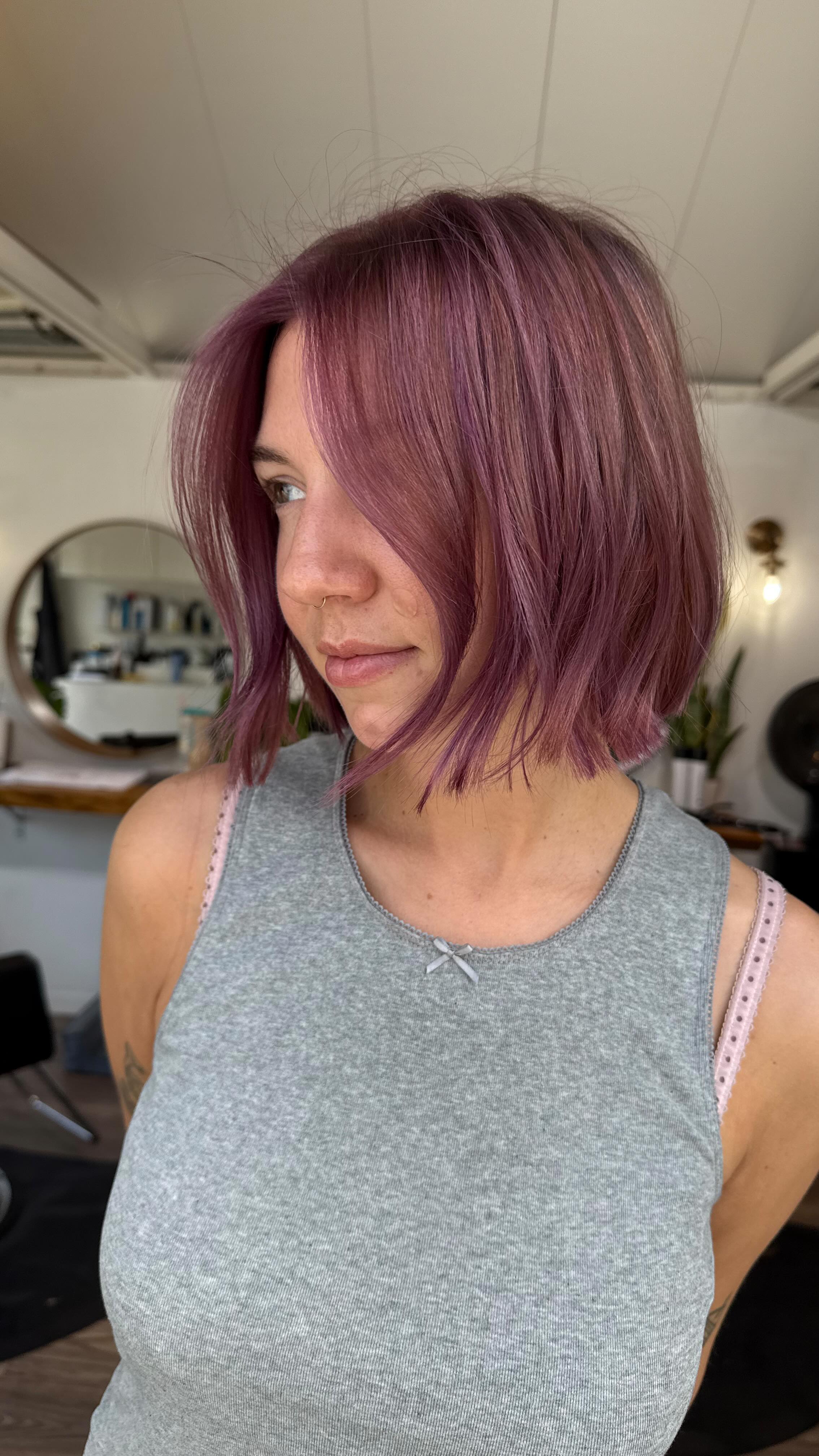 Instagram post by @hairbrained_official for MODERN SALON. Caption reads: PARTY GIRL BOB 💅🏽🔥 for my babe....