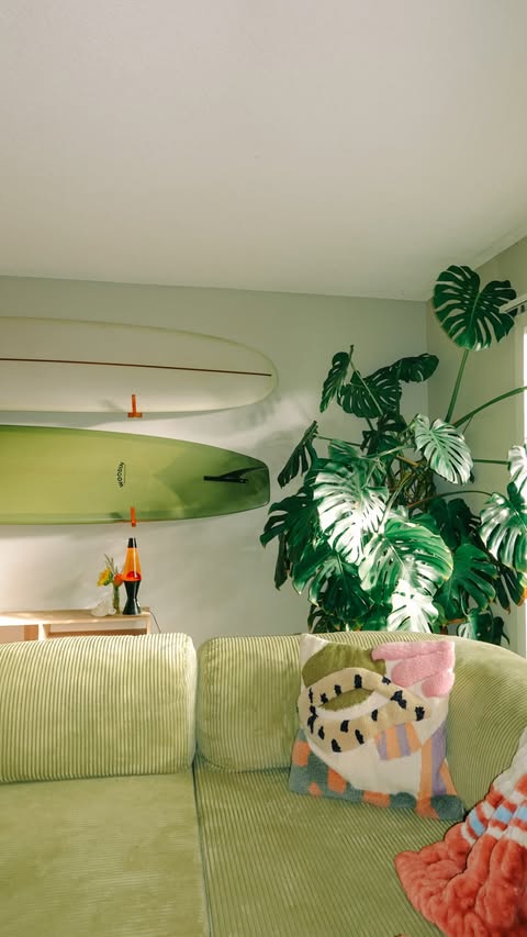 Instagram post by @jess.cliftonn for OMHU. Caption reads: couch of my dreams unlocked :’) @omhu_cph #ad.