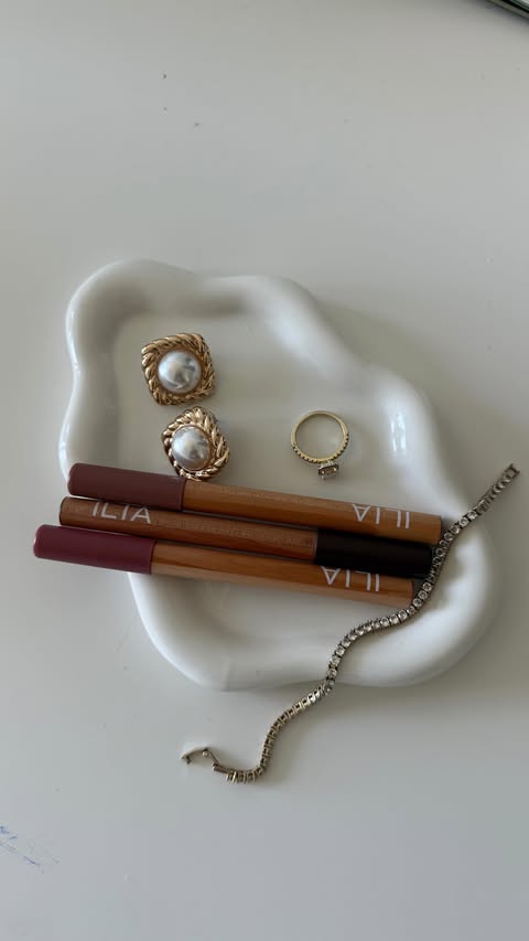 Instagram post by @talmeshak for ILIA Beauty. Caption reads: A creamy lipstick with the precision of a lip....