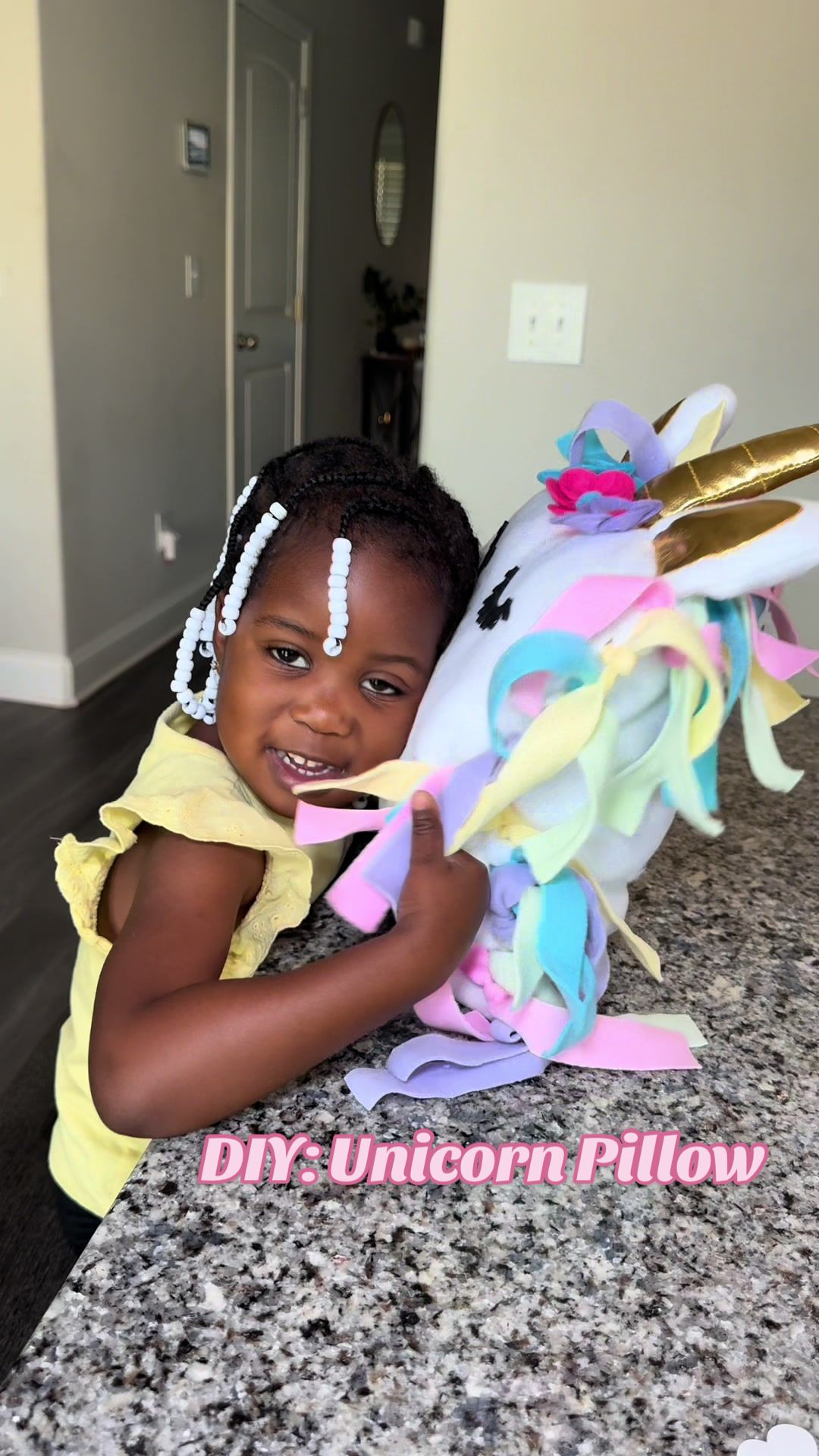 TikTok post by @theandrewsvlogs for Pinwheel Crafts. Caption reads: [...] #unicorn #unicornpillow #pinwheelcrafts....