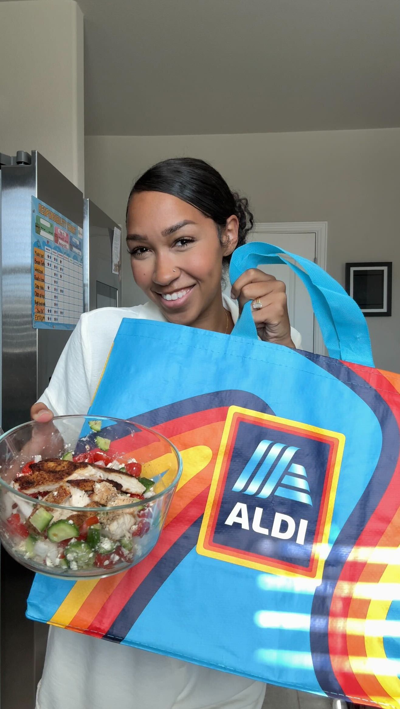 Instagram post by @jaylabrenae for Aldi UK. Caption reads: #ALDIPartner You heard Nyla! This @aldiusa grocery....
