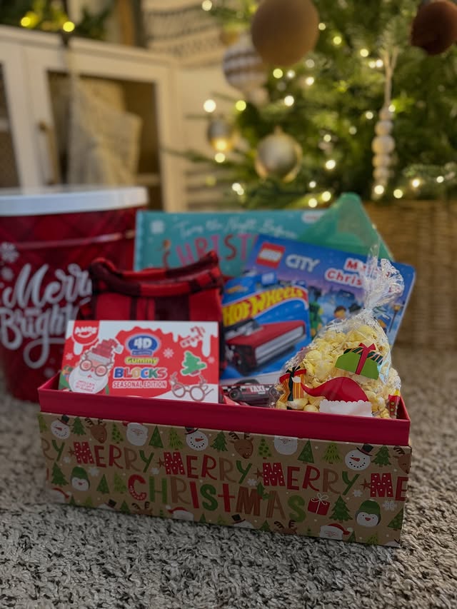 Instagram post by @lifebyallisonblog for The Popcorn Factory. Caption reads: #ad Putting together Christmas boxes might be my....