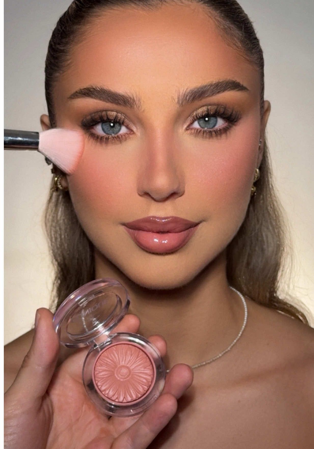 TikTok post by @mrdanielmakeup for Clinique. Caption reads: Nude Pop Glam with @Clinique  High Impact Shadow +....