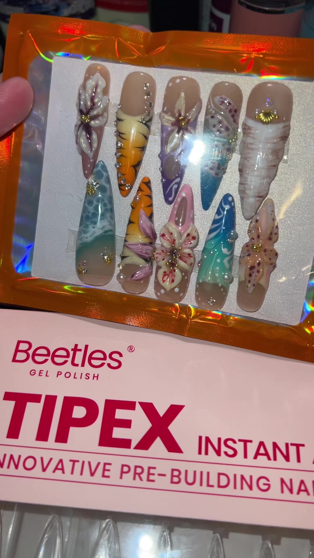 TikTok post by @missandryprincess for Beetles Nail Boutique. Caption reads: @BeetlesGelPolish @Beetles Nail Boutique I LOVE....