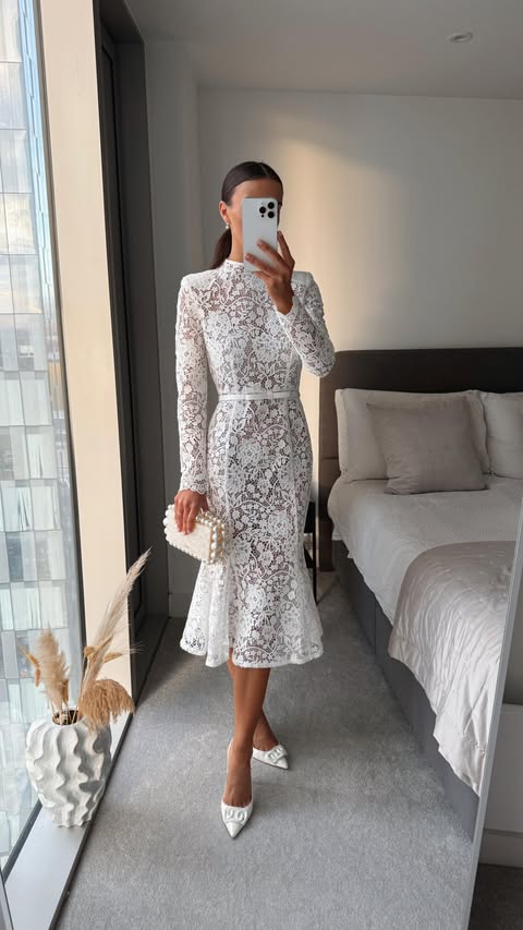 Instagram post by @whatemwore for Nadine Merabi. Caption reads: [...] - with two incredible dresses from....