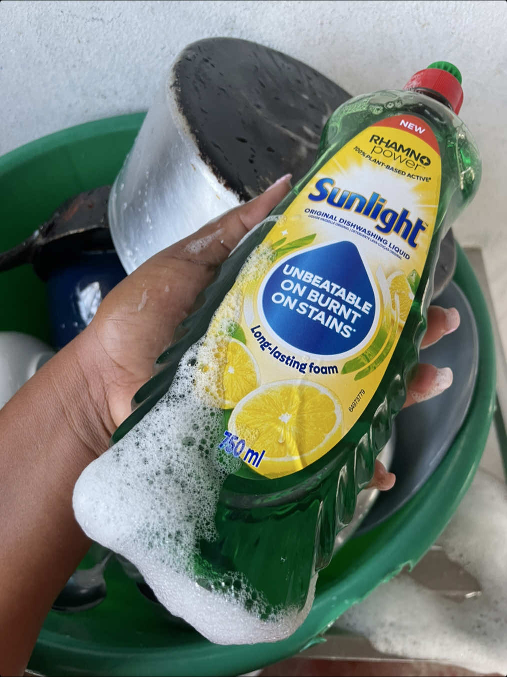 TikTok post by @qhubo_ngema for Cleanipedia. Caption reads: Okay wait, I think I’ll be enjoying washing dishes....