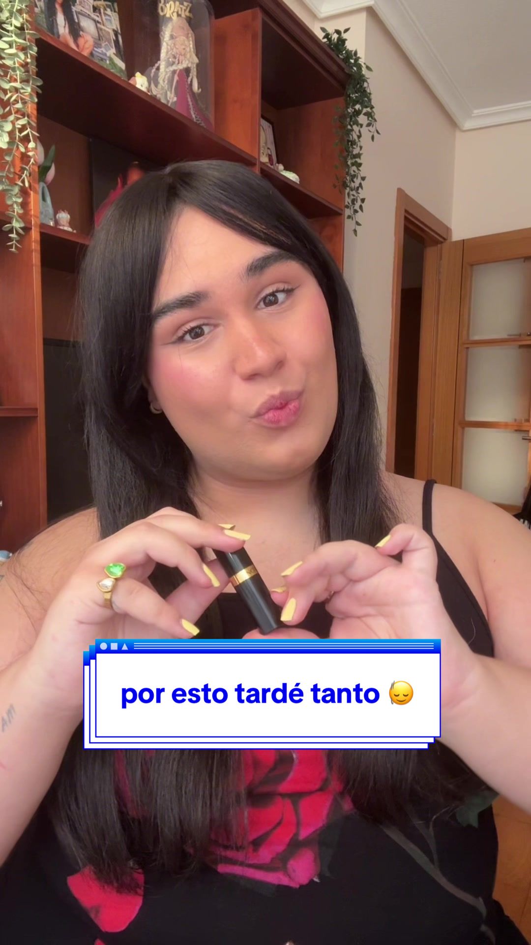 TikTok post by @lizziemcwhore for Revlon. Caption reads: [...] (la fiesta por el lipstick day con @Revlon....