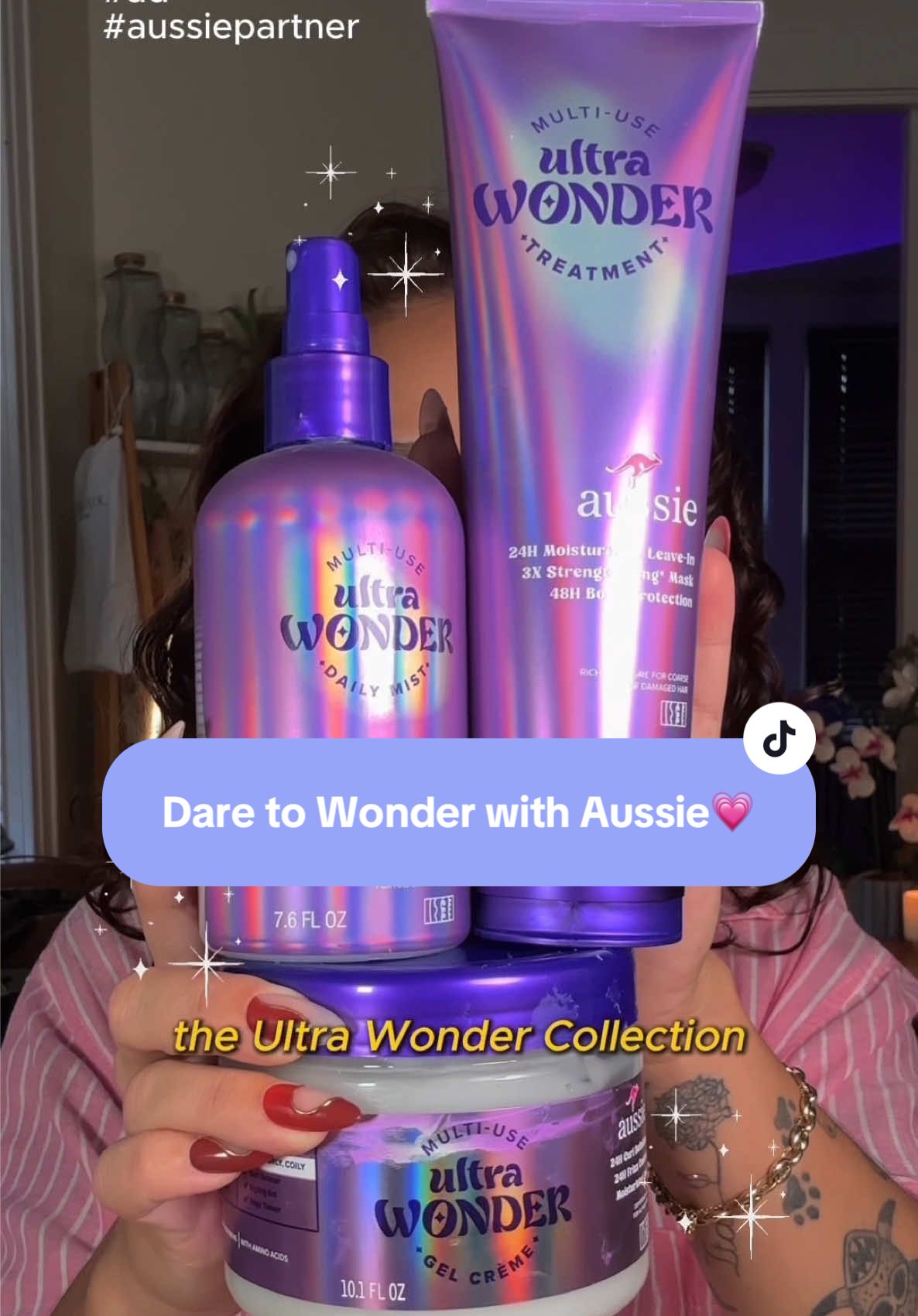 TikTok post by @nemesismarie_06 for Aussie Hair. Caption reads: #ad #aussiepartner @Aussie Hair Care is back at it....