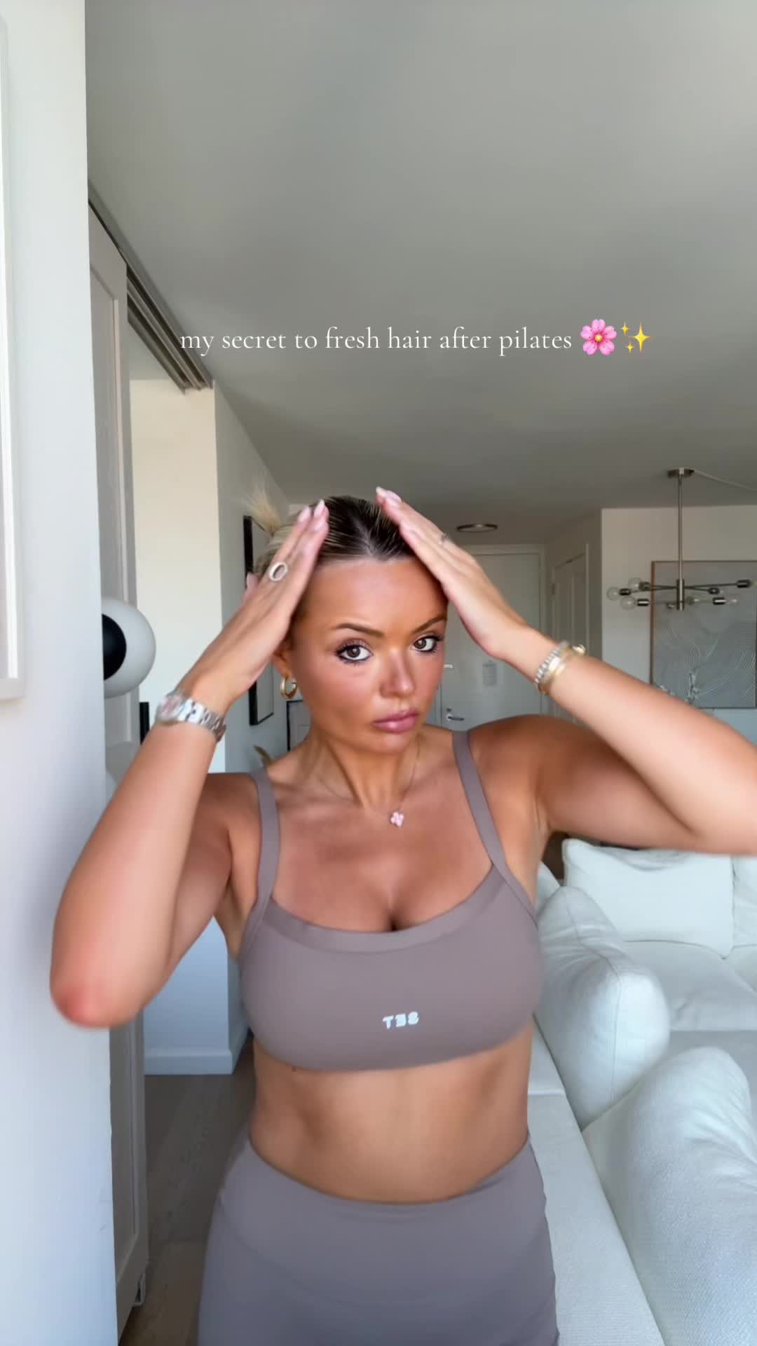TikTok post by @alexisnttiktokfamous for Living Proof. Caption reads: gifted by Living Proof My post-workout hair hack....