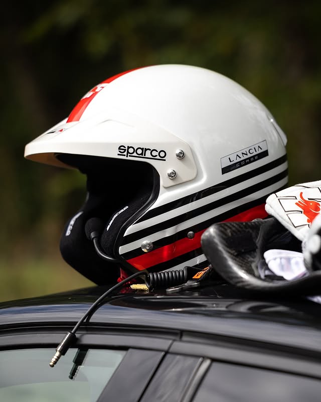 Instagram post by @lancia_corse_official for Sparco. Caption reads: [...] passion. Designed for assure security.....