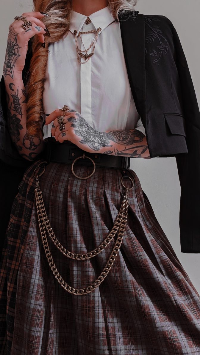 Instagram post by @kllsym for DISTURBIA. Caption reads: A little Dark Academia styling with my favs....