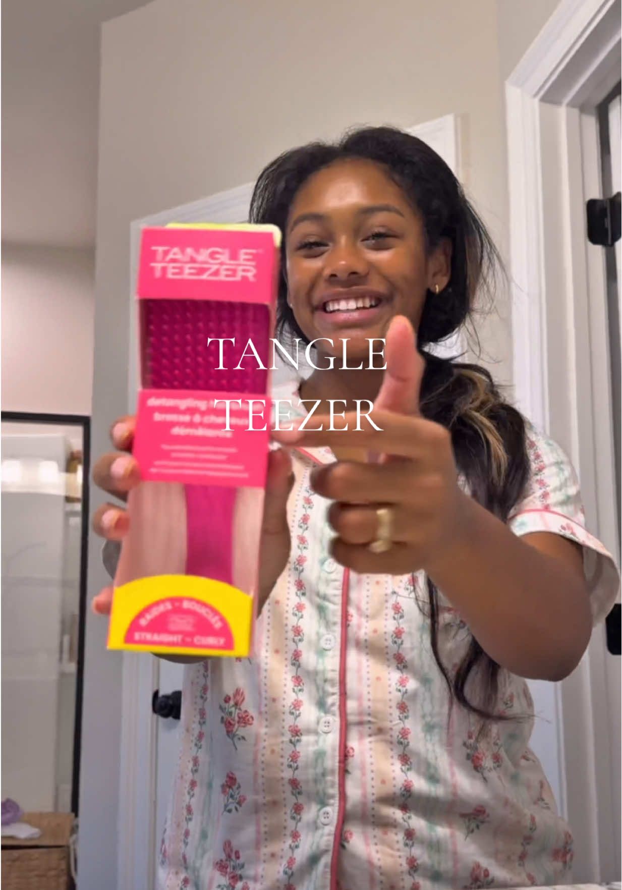 TikTok post by @iimlexiirose for Tangle Teezer. Caption reads: looking good AND feeling good with my mini....