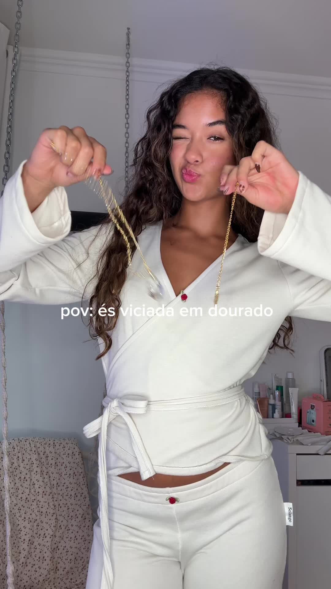 TikTok post by @malumatosof for En Route Jewelry. Caption reads: gold girlie 😋 | @en route jewelry #gold....