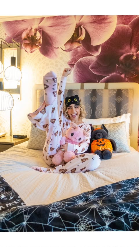 Instagram post by @ash_alexandria_ for Halloween Horror Nights. Caption reads: Come with me on the ULTIMATE spooky staycation....