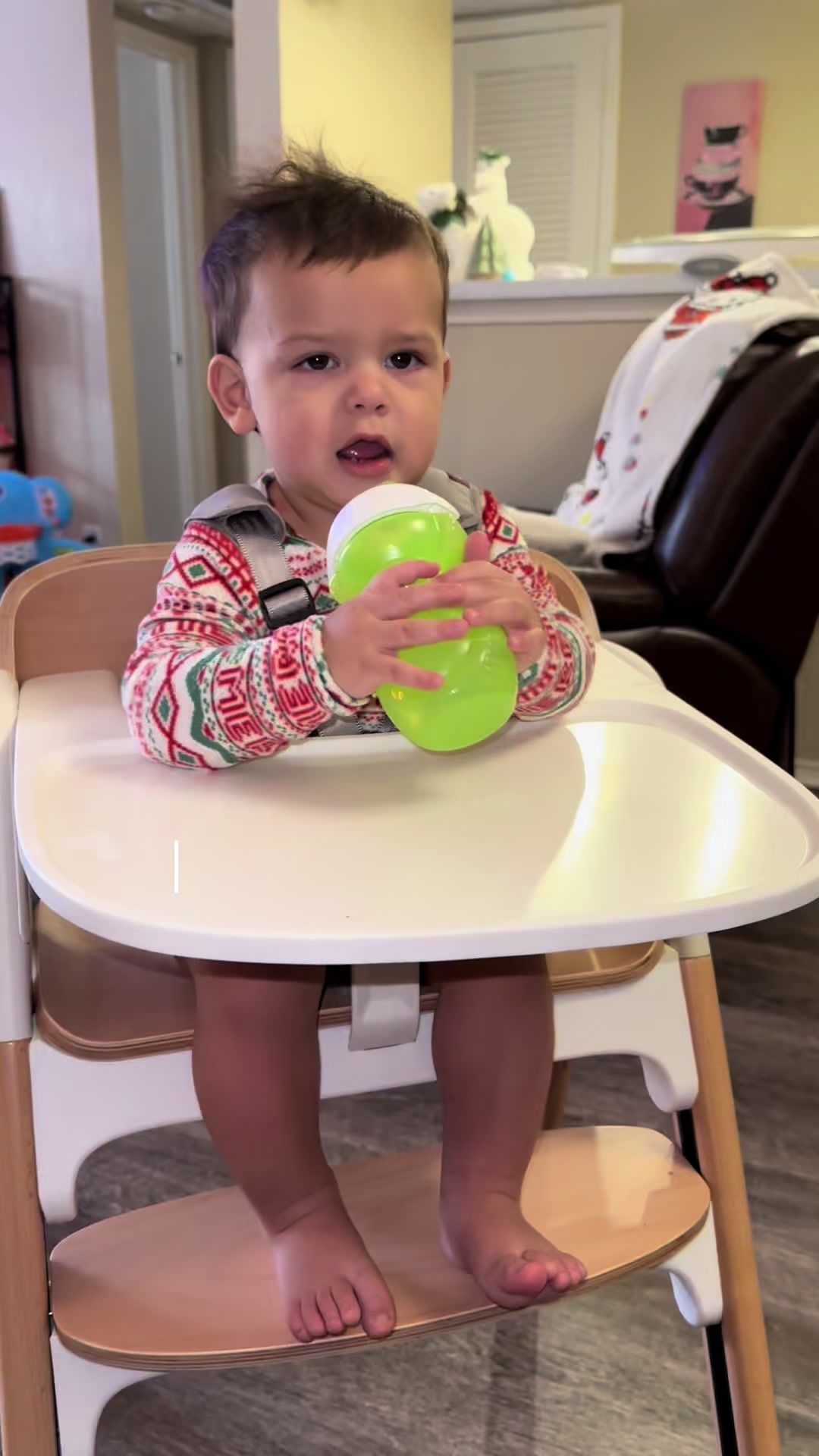 TikTok post by @allisonmaexo for Momcozy. Caption reads: L9VMXYCA 20% off on amazon for high chair 🪑 📦 ....