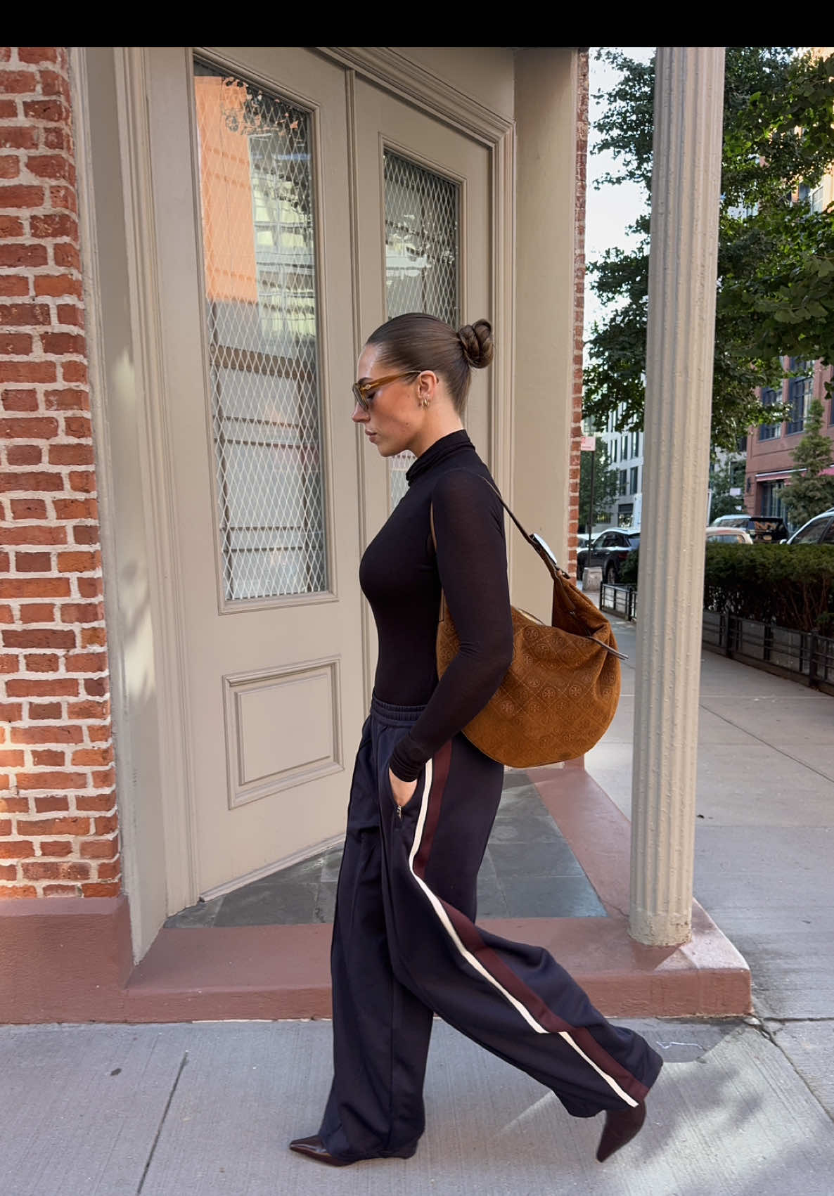 TikTok post by @livmanni for Allure. Caption reads: [...] @TORY BURCH SUBLIME is officially an @Allure....