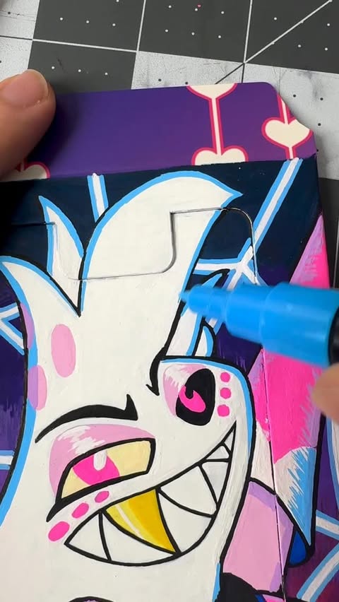 Instagram post by @spindlehorsetoons for Youtooz. Caption reads: Arts and Crafts with Angel Dust 🥰 #youtooz....