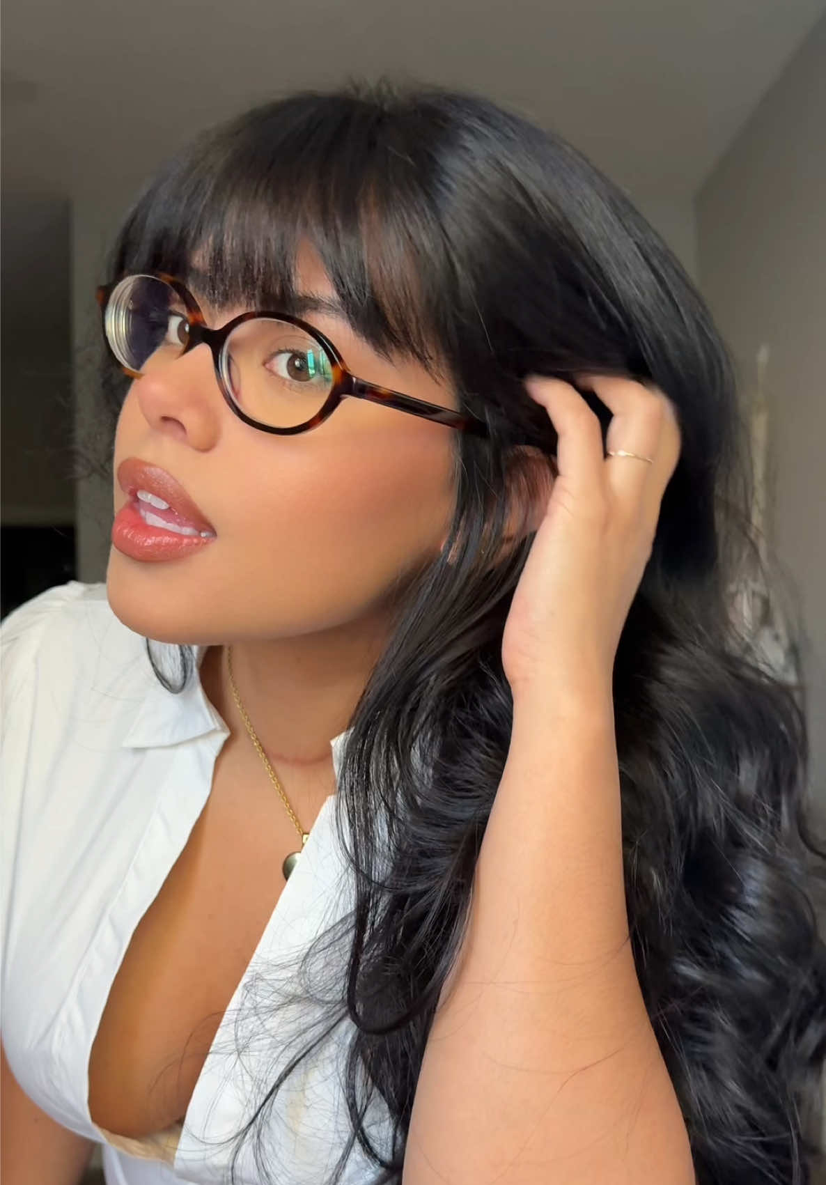 TikTok post by @hannahncortez for Eyebuydirect. Caption reads: My current eyewear rotation with @Eyebuydirect....