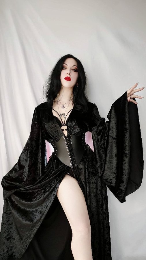 Instagram post by @hekate_nocturnal for Petals and Poison. Caption reads: [...] 🌹Arch necklace + rings: @petalsandpoison....