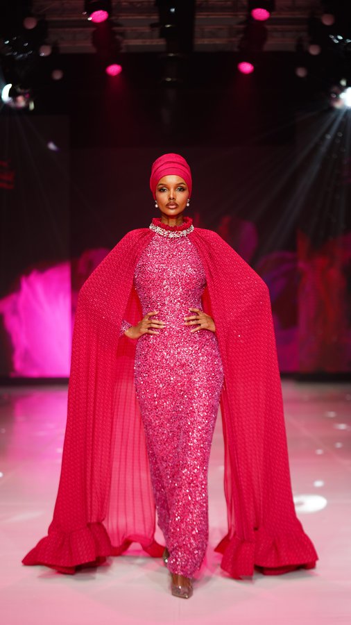 Instagram post by @halima for BUTTONSCARVES. Caption reads: [...] honored to walk the runway for....