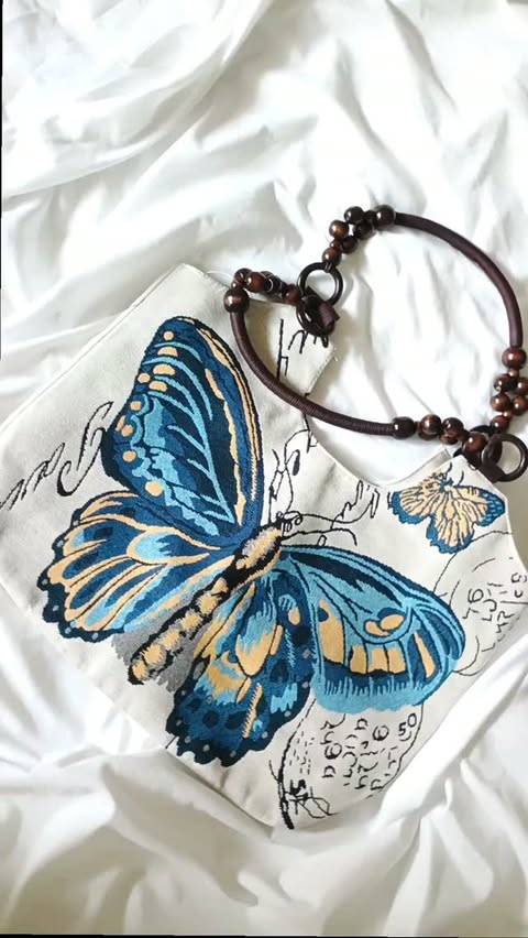 Instagram post by @alissa.denae for Shop LC. Caption reads: [...] butterfly print on this SHOP LC Butterfly....