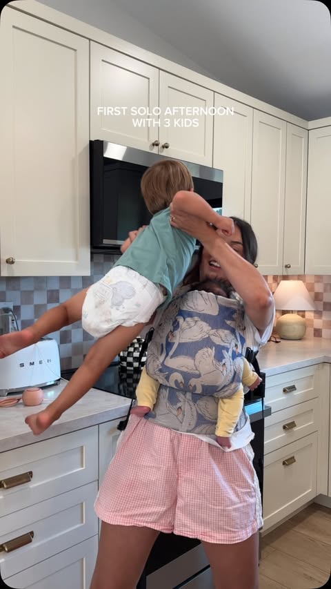 Instagram post by @candi.ortega1 for Drink Love. Caption reads: Anything you can I do, I can do with a baby on my....